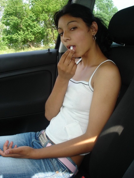 Indian teen unveils her firm tits and pussy while in a vehicle