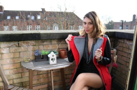 French woman Chloe bares her small tits before masturbating in stockings