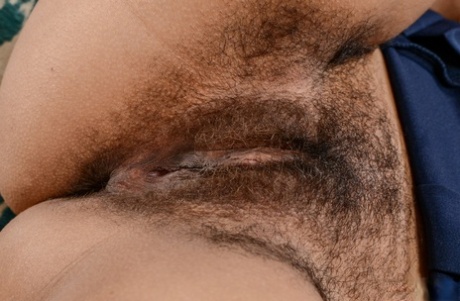 Amateur American Kitty Catherine reveals her hairy muff and hot ass in a solo
