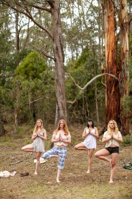 Gorgeous Australian girls practicing yoga in their hot outfits in nature