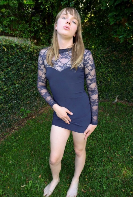 Hung shemale Lily Petals shows off her big balls while wanking outdoors