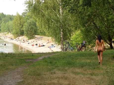 Beautiful brunette Mary strips and walks butt naked shamelessly in nature